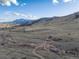 Sweeping aerial view of the surrounding mountains and grassy plains near the property at 4825 6Th St, Boulder, CO 80304