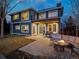 Expansive backyard with patio furniture, a fire pit, balcony and a view of the home's exterior at 4825 6Th St, Boulder, CO 80304