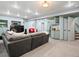 Basement featuring a large sectional, entertainment area, and a stylish wet bar at 4825 6Th St, Boulder, CO 80304