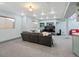 Spacious finished basement with a large sectional sofa and entertainment area at 4825 6Th St, Boulder, CO 80304