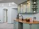 The basement bar features custom cabinets and granite countertops, perfect for entertaining at 4825 6Th St, Boulder, CO 80304