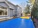 Back of the house with a full basketball court; a great outdoor activity area for Gathering and friends at 4825 6Th St, Boulder, CO 80304
