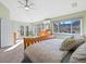 Bedroom featuring light green walls, carpet floors, and large windows with mountain views at 4825 6Th St, Boulder, CO 80304