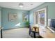 Bright bedroom with large windows, neutral walls, and ceiling fan at 4825 6Th St, Boulder, CO 80304