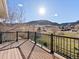 Deck overlooking serene views, wood decking and black metal railings at 4825 6Th St, Boulder, CO 80304