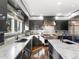 Bright kitchen featuring stainless appliances, gray cabinets, hardwood floors, and marble countertops at 4825 6Th St, Boulder, CO 80304