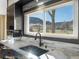 Bright kitchen sink featuring a view of the serene outdoor landscape at 4825 6Th St, Boulder, CO 80304