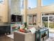Cozy living room with a fireplace, high ceilings, large windows and plenty of natural light at 4825 6Th St, Boulder, CO 80304
