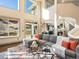 Spacious living room with high ceilings, many windows, and hardwood floors at 4825 6Th St, Boulder, CO 80304