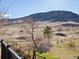 Tranquil hillside view from deck showcasing the neighborhood and rolling hills at 4825 6Th St, Boulder, CO 80304