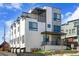 Contemporary townhome featuring modern architecture, private balconies, and individual garages at 1215 N Perry St, Denver, CO 80204