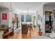 Modern kitchen with stainless steel appliances, a center island, and hardwood floors at 1215 N Perry St, Denver, CO 80204