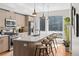 Stylish kitchen with stainless steel appliances, a large center island, and plenty of cabinet space at 1215 N Perry St, Denver, CO 80204