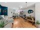 Bright and airy living space with hardwood floors, modern furniture, and stylish décor at 1215 N Perry St, Denver, CO 80204
