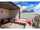 Inviting outdoor patio featuring cozy seating arrangements, a comfortable couch and stylish accents at 1215 N Perry St, Denver, CO 80204