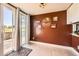 Bright dining area features sliding glass doors to backyard and decorative wall art at 234 Cypress Cir, Broomfield, CO 80020