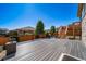 Expansive back deck with stairs to the yard, offering ample space for outdoor gatherings and relaxation at 17028 Osage St, Broomfield, CO 80023