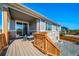 Spacious back deck with stairs, comfortable seating, offering an inviting outdoor living space at 17028 Osage St, Broomfield, CO 80023