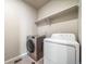 Laundry room featuring washer and dryer at 17028 Osage St, Broomfield, CO 80023