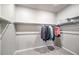 Spacious walk-in closet with ample storage and carpet flooring at 17028 Osage St, Broomfield, CO 80023