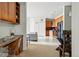 Open concept living space with dining area, built-in desk, living room, and kitchen at 9481 E Mansfield Ave # 203, Aurora, CO 80014