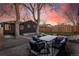 This backyard offers a stone patio with outdoor seating, perfect for entertaining guests at 4565 Elm Ct, Denver, CO 80211