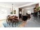 Inviting dining area that seamlessly flows into the kitchen, perfect for entertaining at 4565 Elm Ct, Denver, CO 80211