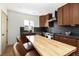 A shot of the kitchen workspace and stainless appliances at 4565 Elm Ct, Denver, CO 80211