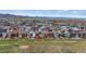 This aerial shot highlights the property's location within a well-planned community, surrounded by green spaces at 9130 Fraser River, Littleton, CO 80125