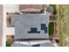 Aerial view of a roof featuring solar panels and a landscaped yard at 9130 Fraser River, Littleton, CO 80125