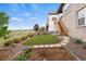 Backyard has an artificial turf area, and stairway access to a private deck at 9130 Fraser River, Littleton, CO 80125