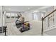 Finished basement features recreational space and workout area with fitness equipment and abundant natural light at 9130 Fraser River, Littleton, CO 80125