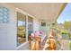 Large balcony with lounge and seating area, planters, outdoor living space, and natural light at 1090 N Lafayette St # 504, Denver, CO 80218