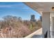 Enjoy the tranquil view from the balcony overlooking treetops and nearby buildings at 1090 N Lafayette St # 504, Denver, CO 80218