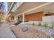 Inviting building entrance with manicured landscaping and modern architectural details at 1090 N Lafayette St # 504, Denver, CO 80218
