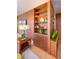 Charming living room featuring a built-in bookshelf and entertainment center for storage at 1090 N Lafayette St # 504, Denver, CO 80218