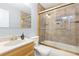 Tiled bathroom with bathtub and shower at 6462 E Bates Ave, Denver, CO 80222