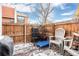 Private patio with seating and small garden area at 6462 E Bates Ave, Denver, CO 80222