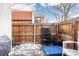 Small patio with storage and seating area at 6462 E Bates Ave, Denver, CO 80222