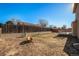 Large backyard with a firepit and wooden fence at 302 Linden St, Frederick, CO 80530