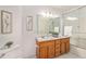 Clean bathroom with updated vanity and shower/tub combo at 302 Linden St, Frederick, CO 80530