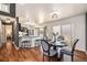 Charming dining area adjacent to the kitchen, perfect for gatherings at 302 Linden St, Frederick, CO 80530