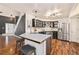 Updated kitchen featuring stainless steel appliances and ample cabinet space at 302 Linden St, Frederick, CO 80530