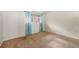 Cozy bedroom with neutral carpet, and a window with blue curtains at 8870 W Jewell Ave # 11, Lakewood, CO 80232