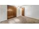 This bedroom features a closet and neutral carpet at 8870 W Jewell Ave # 11, Lakewood, CO 80232