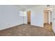 Bedroom with a window, closet, and access to the hallway at 14493 E Jewell Ave # 103, Aurora, CO 80012