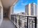 Exterior balcony with gorgeous wrought iron railings and city views at 975 N Lincoln St # 4F, Denver, CO 80203