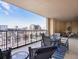 Spacious balcony showcasing an outdoor dining table and comfortable patio chairs at 975 N Lincoln St # 4F, Denver, CO 80203