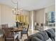 Cozy dining area featuring a round table with seating and a view of the sliding glass doors at 975 N Lincoln St # 4F, Denver, CO 80203