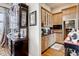 Butler's pantry featuring custom cabinets, granite countertops, wine storage, and modern appliances at 6963 S Espana Way, Centennial, CO 80016